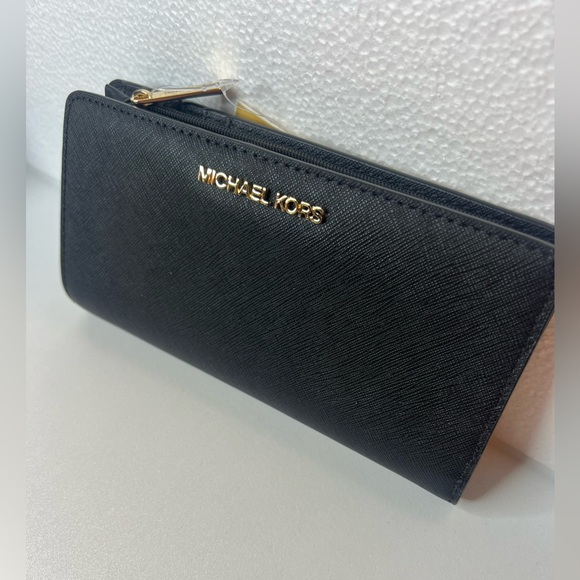 Michael Kors Handbags - Michael Kors Black and Gold Wallet